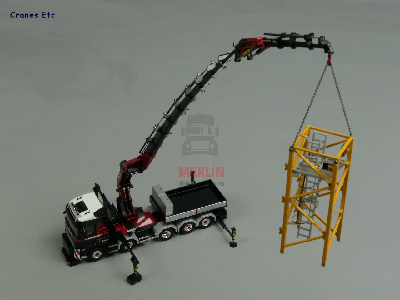 1/50 MAMMOET; VOLVO FH5 GLOBETROTTER 10X4 TAG AXLE WITH PALFINGER 165002 + JIB AND BALLASTBOX WITH HITCH