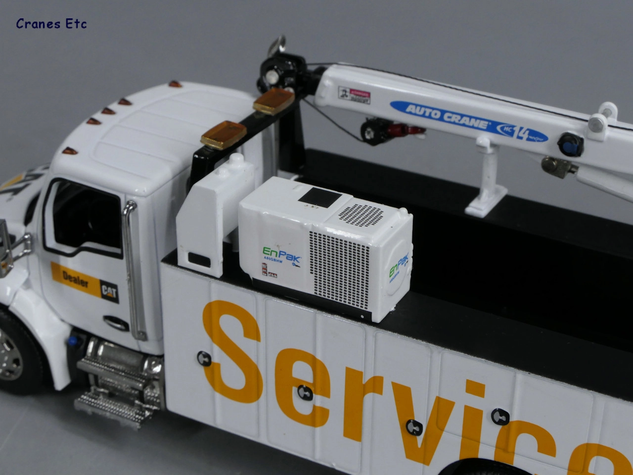 Truck Kenworth T380 Auto-Crane Titan 85 body with Miller EnPak 1:50