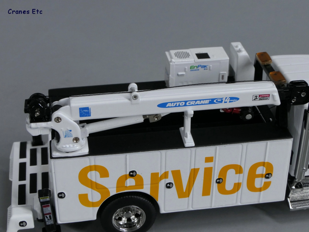 Truck Kenworth T380 Auto-Crane Titan 85 body with Miller EnPak 1:50